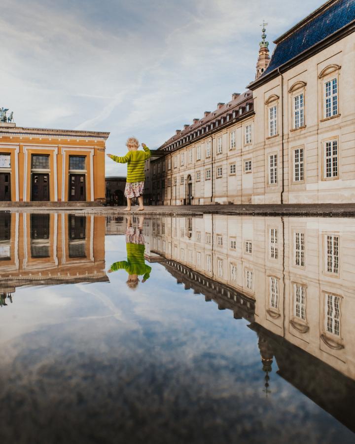 Mirrored image in puddle at Thorvaldsens Museum