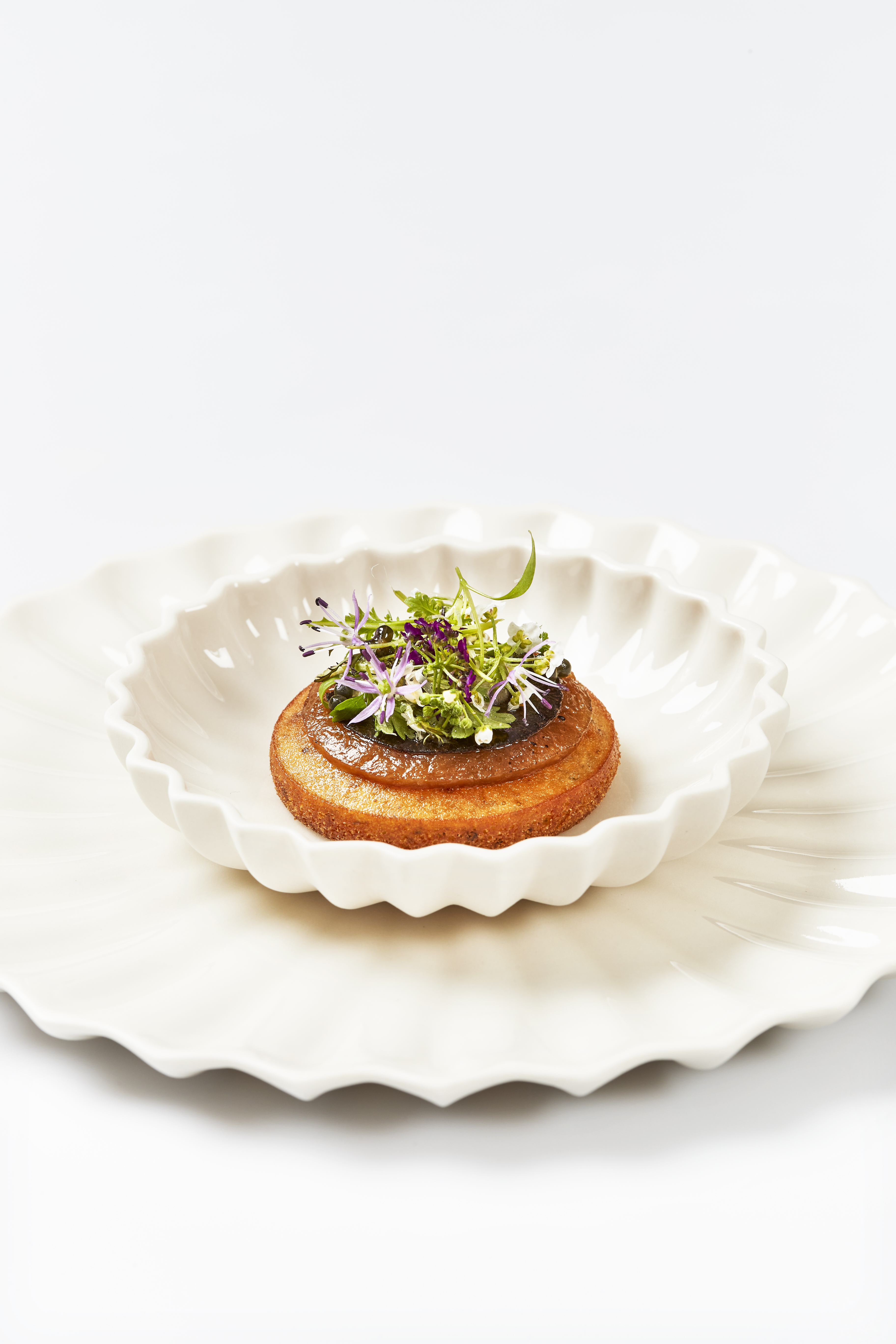 Geranium - Rasmus Kofoed - Bread pancake with buttermilk, ramson & winter truffle - Photo Credit - Claes Bech-Poulsen -50.jpg