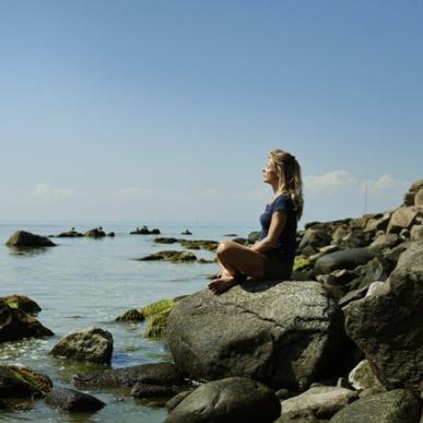 Woman sitting in the sun 